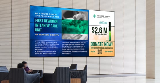 A donor wall featuring an update on the Monroe Grace General Hospital’s fundraising campaign.